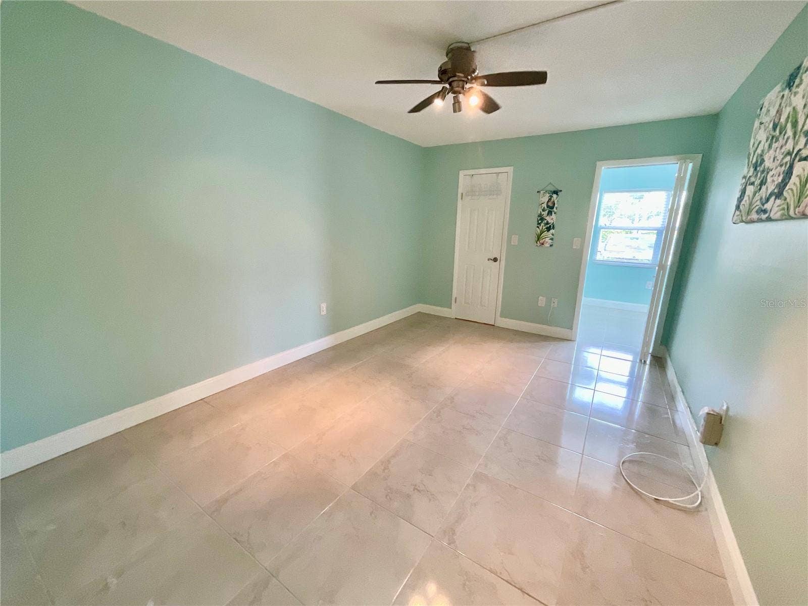 10034 64TH AVENUE N, #11, St Petersburg, FL 33708 Bedroom with walk-in closet