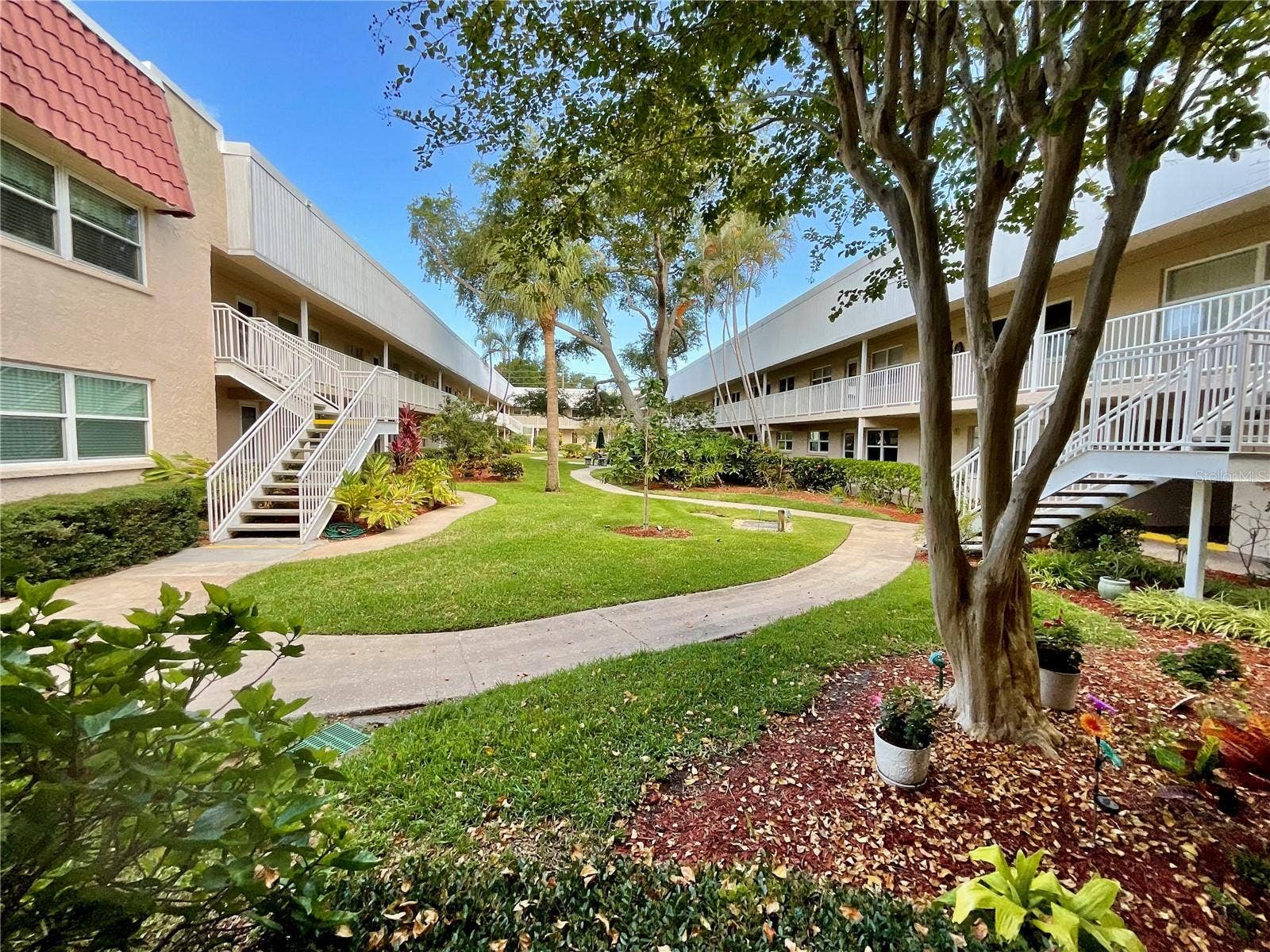 10034 64TH AVENUE N, #11, St Petersburg, FL 33708 Courtyard of your building
