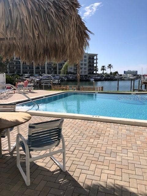 255 DOLPHIN POINT, #307, Clearwater Beach, FL 33767 Relax under the shade a the tiki table.