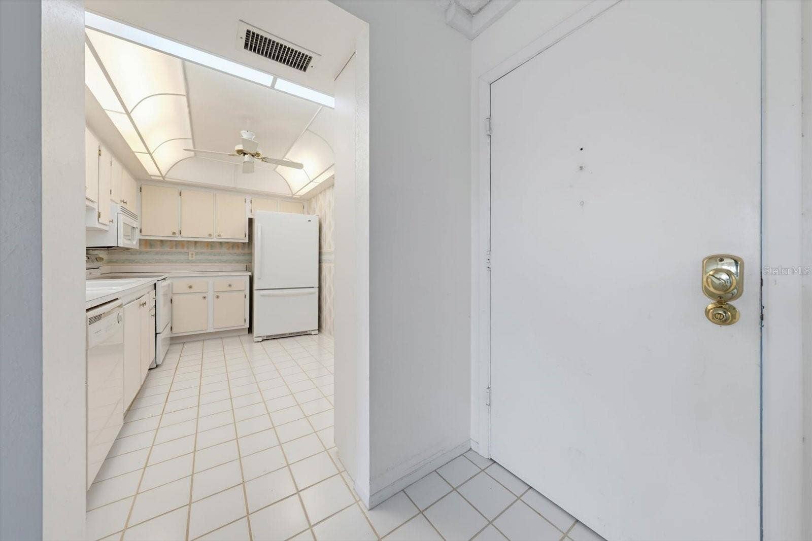 255 DOLPHIN POINT, #307, Clearwater Beach, FL 33767 Entry looking towards kitchen