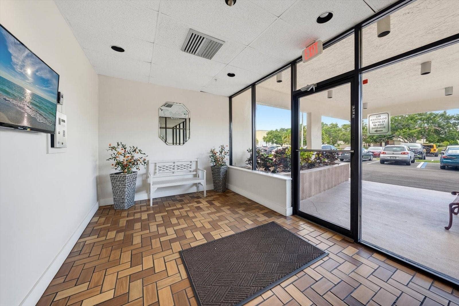 255 DOLPHIN POINT, #307, Clearwater Beach, FL 33767 Front lobby entrance featuring secure entry