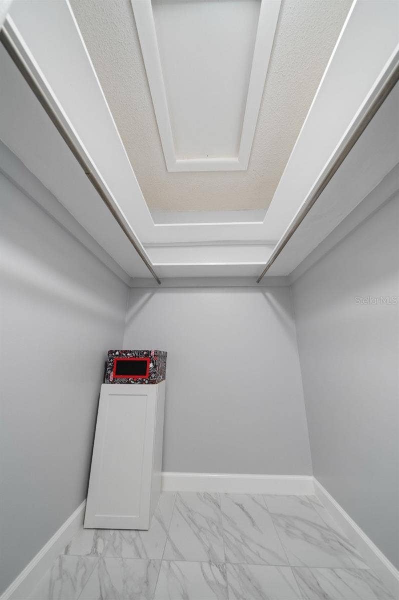 HALL CLOSET, STORAGE, ATTIC ACCESS. PREVIOUSLY GREAT GRANDKIDS PLAYROOM. IT'S THAT BIG. THERE IS ALSO A LINEN CLOSET IN THIS HALL.