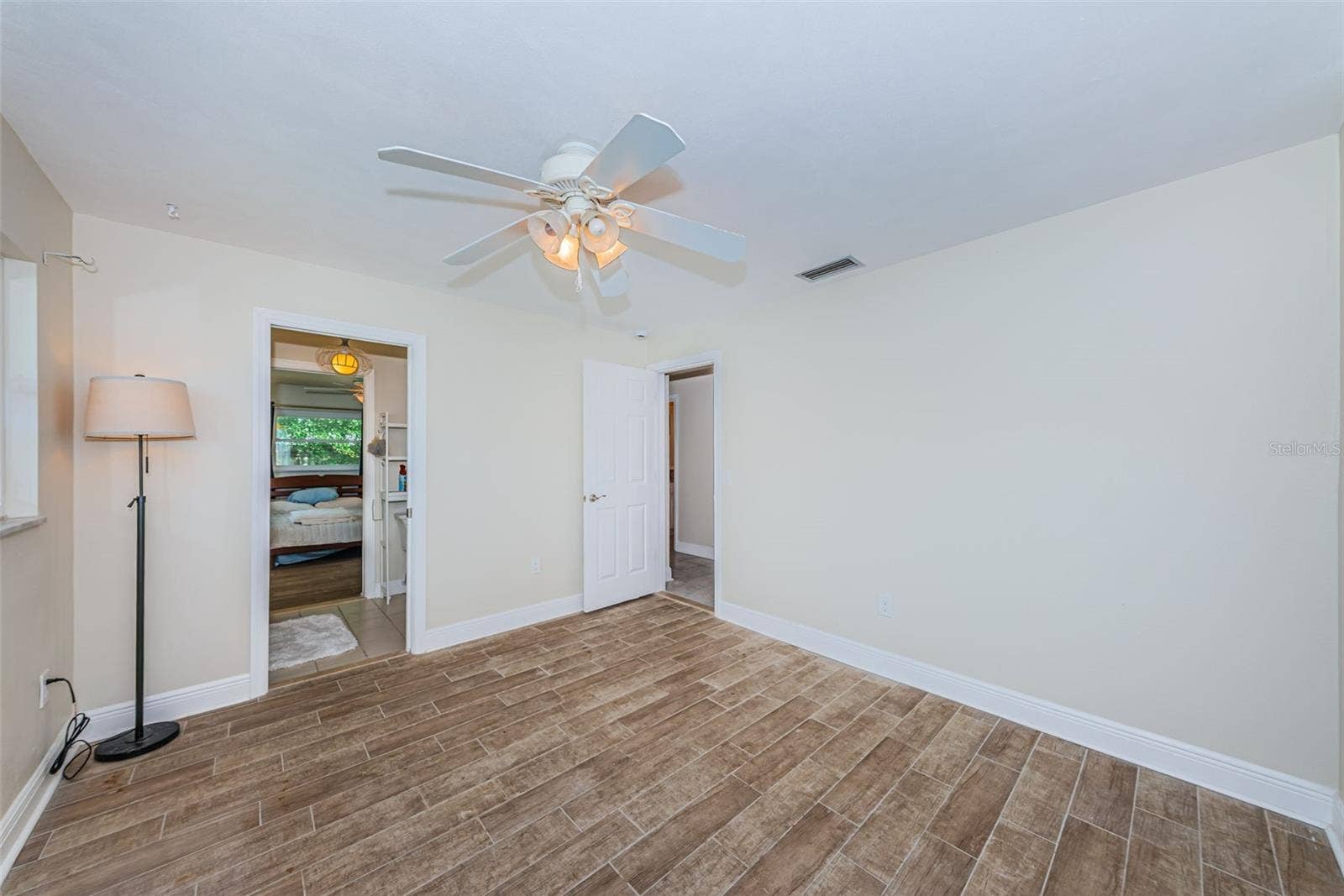 5230 VENETIAN BOULEVARD NE, St Petersburg, FL 33703 Bedroom 3 with pretty flooring