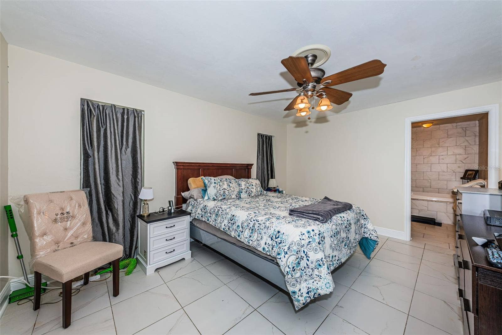 5230 VENETIAN BOULEVARD NE, St Petersburg, FL 33703 Primary bedroom with large bathroom and walk in closet
