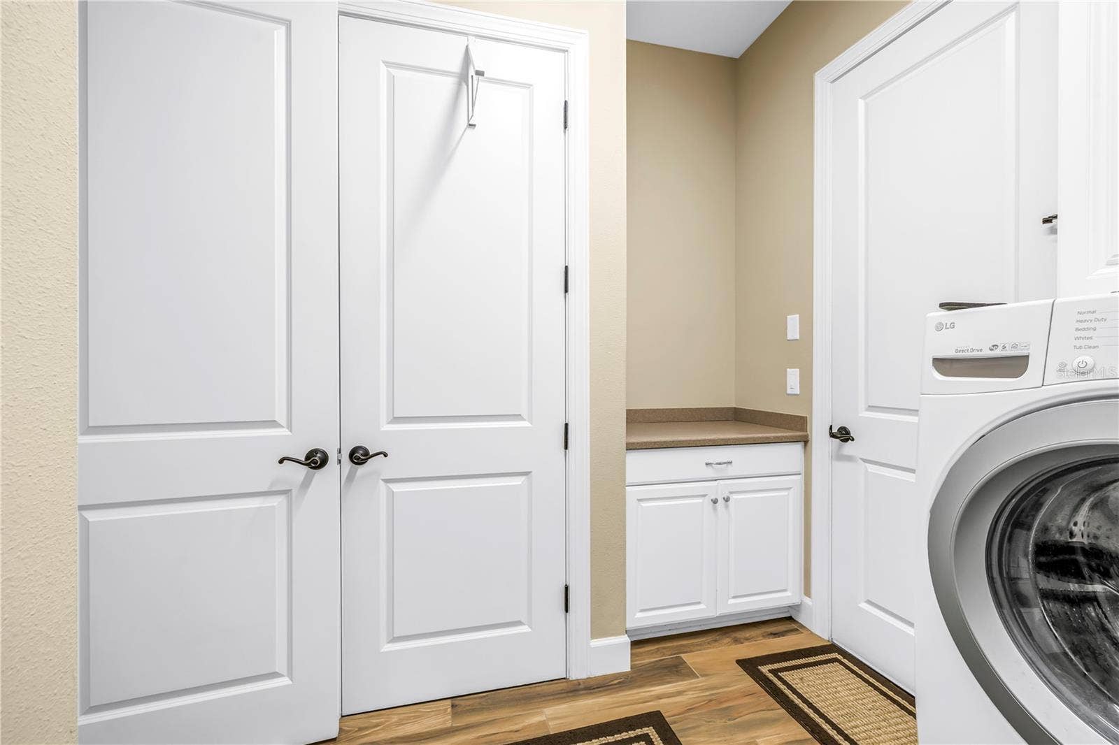 9912 BATCHELDER TERRACE, Palmetto, FL 34221 Built in Laundry Cabinets