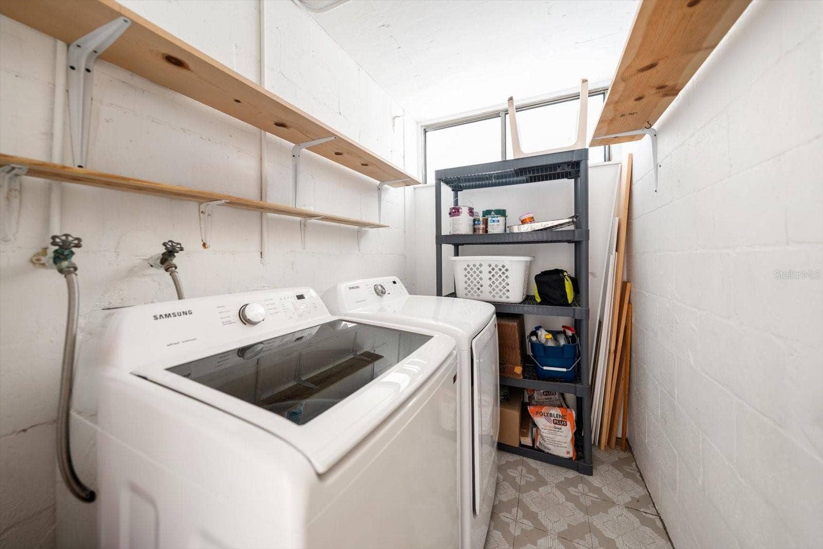 2614 COVE CAY DRIVE, #409, Clearwater, FL 33760 private laundry room and storage