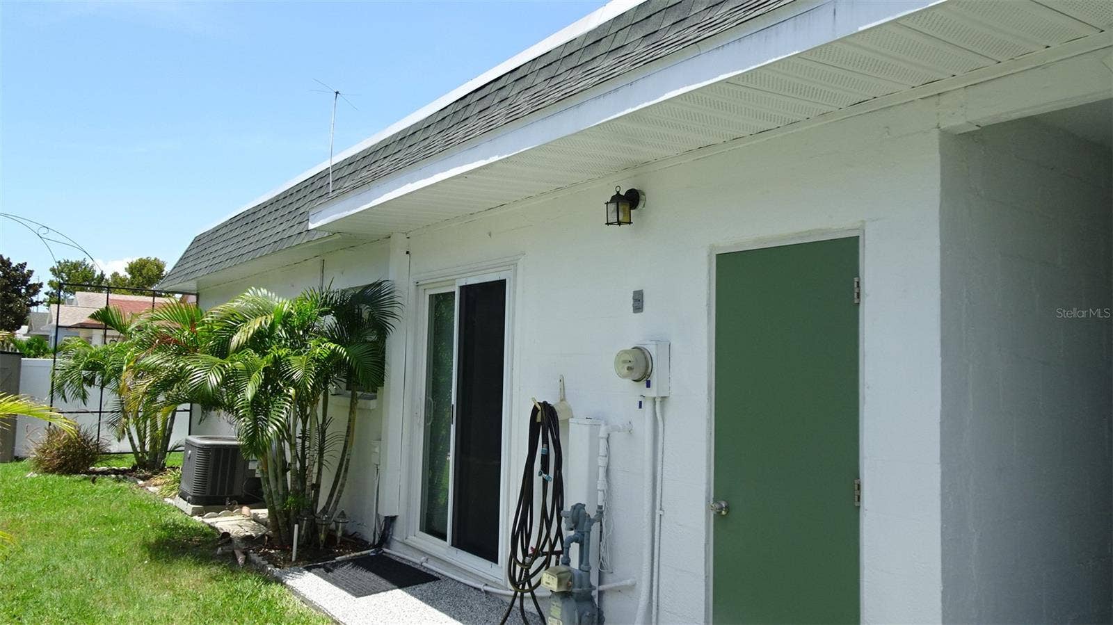 7868 40TH AVENUE N, #7868, St Petersburg, FL 33709 Rear yard, access to laundry room