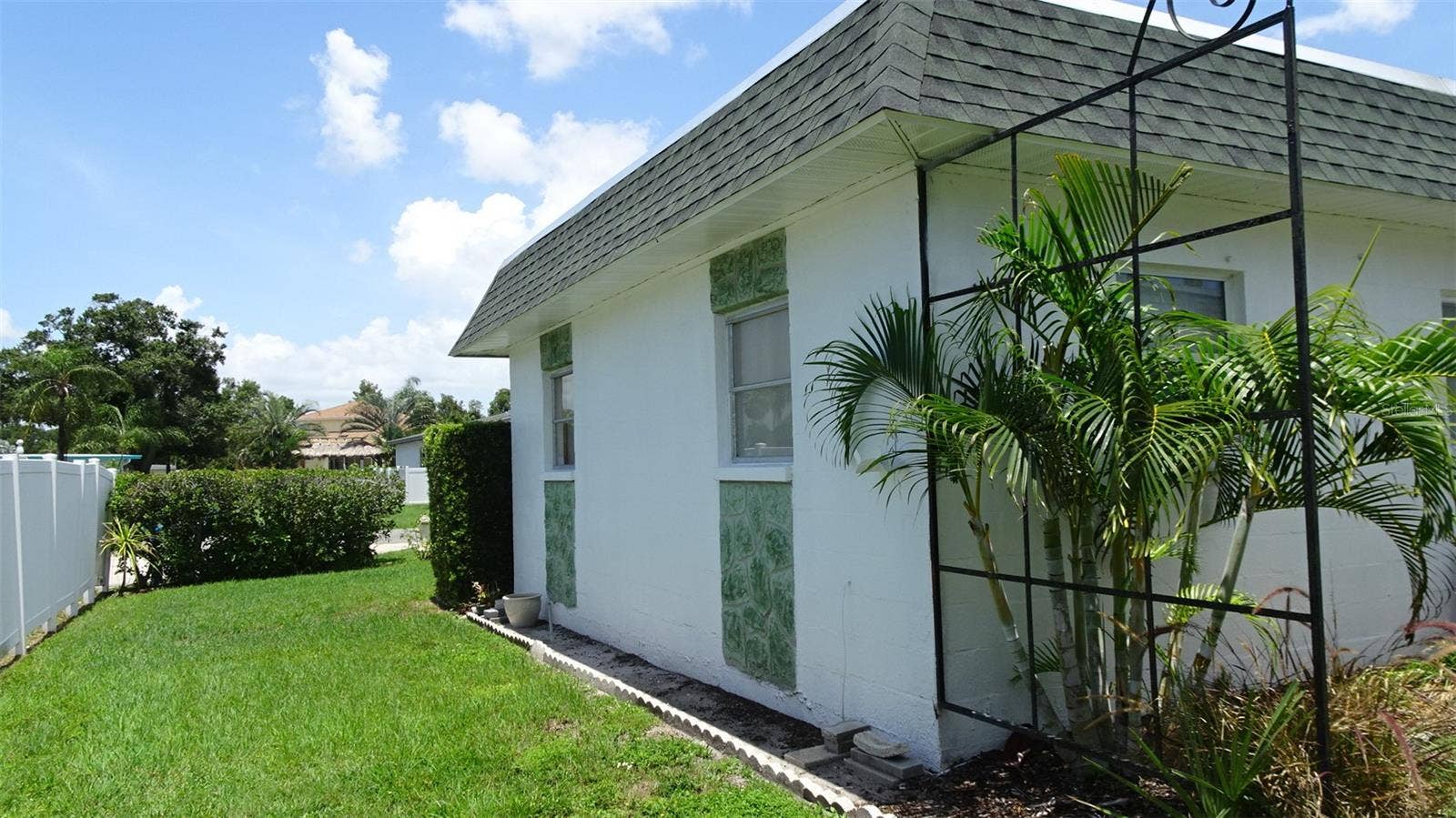 7868 40TH AVENUE N, #7868, St Petersburg, FL 33709 West side of yard, corner lot