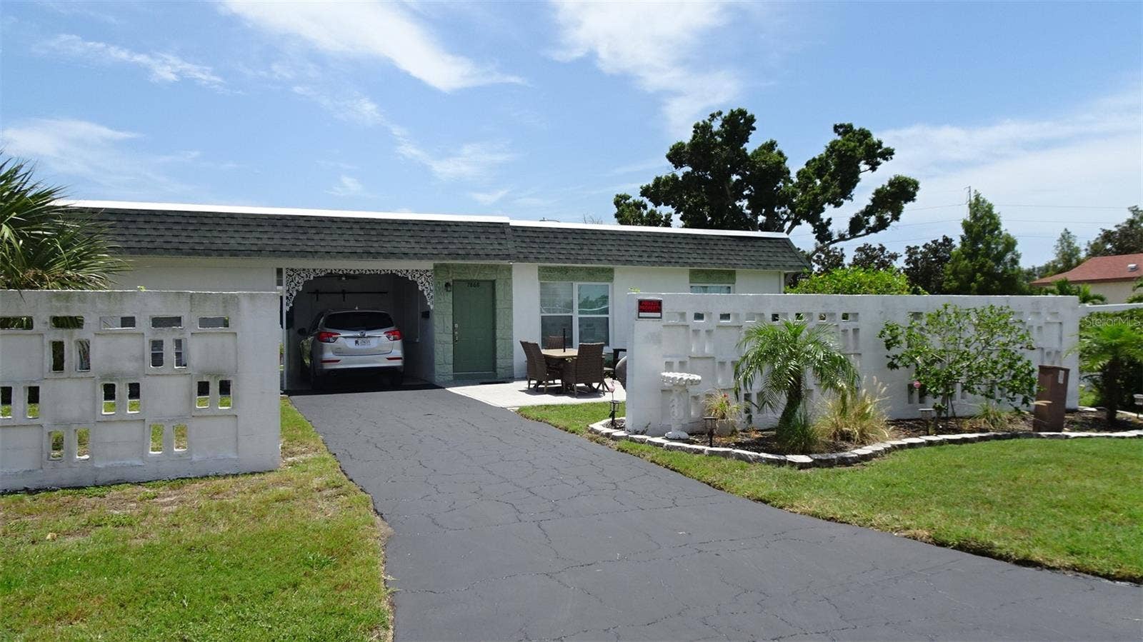 7868 40TH AVENUE N, #7868, St Petersburg, FL 33709 Corner Villa, extra long driveway and large front yard.