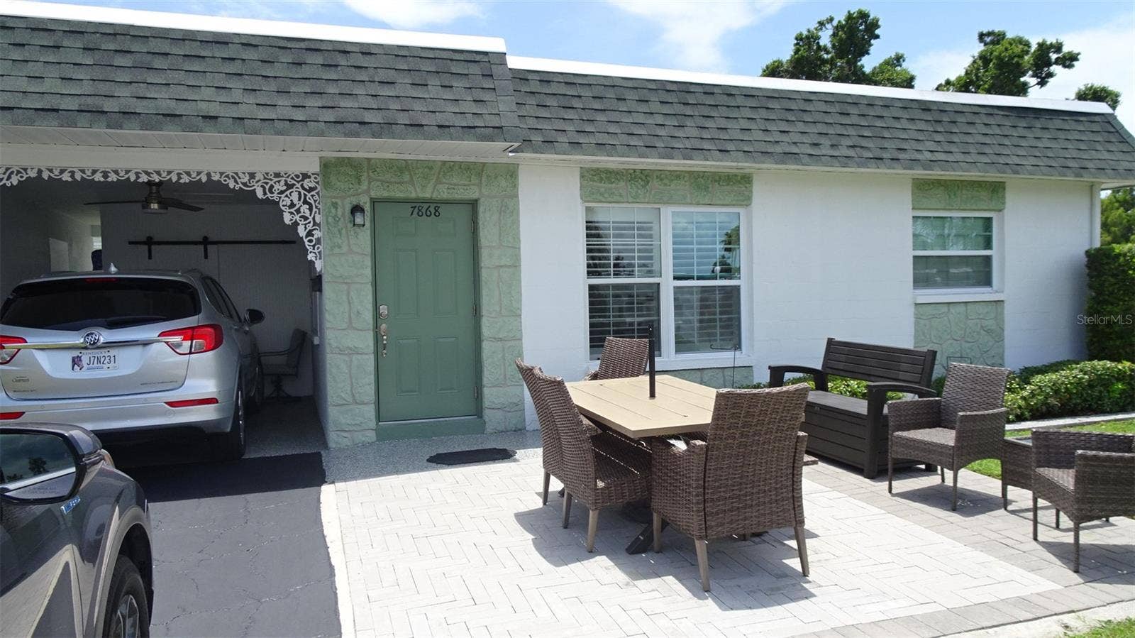 7868 40TH AVENUE N, #7868, St Petersburg, FL 33709 Private front yard patio.