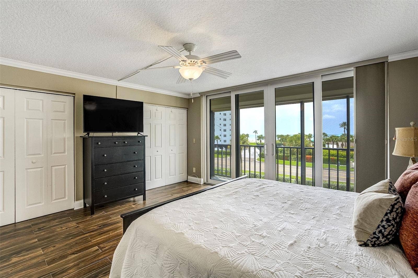 1581 GULF BOULEVARD, #203N, Clearwater Beach, FL 33767 Primary Bedroom With Sliders To Outdoor Balcony