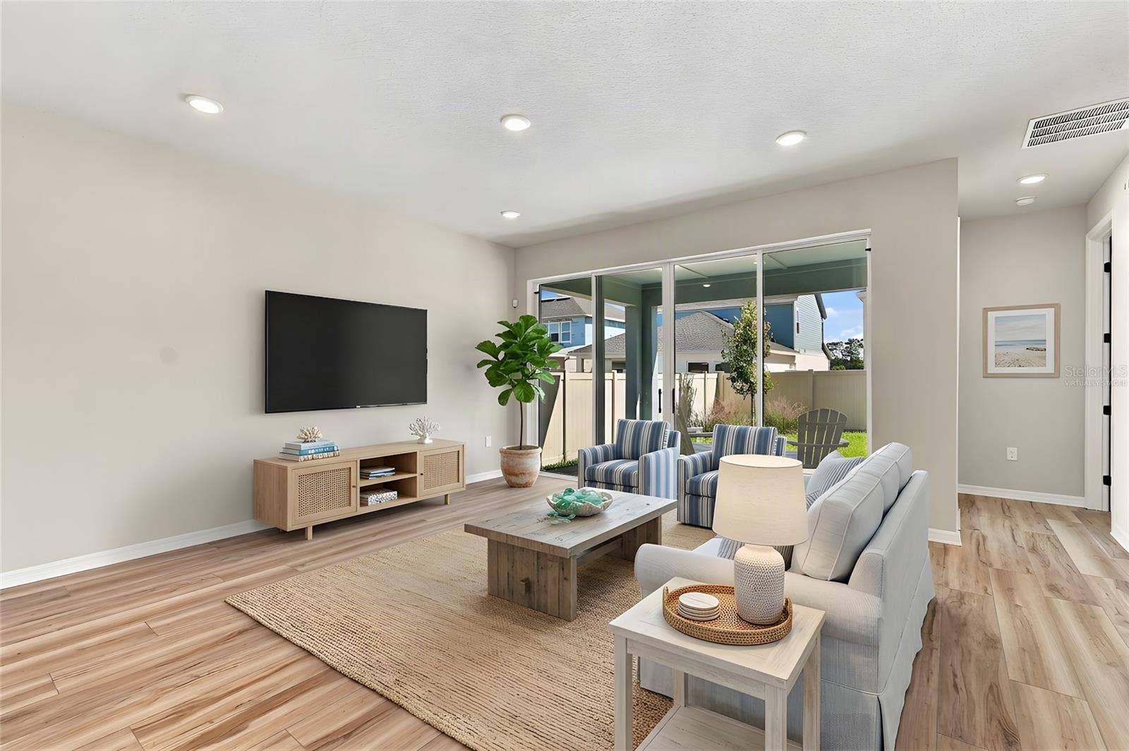 5825 NATIVE OAK STREET, Mount Dora, FL 32757 Family Room **Virtually Staged