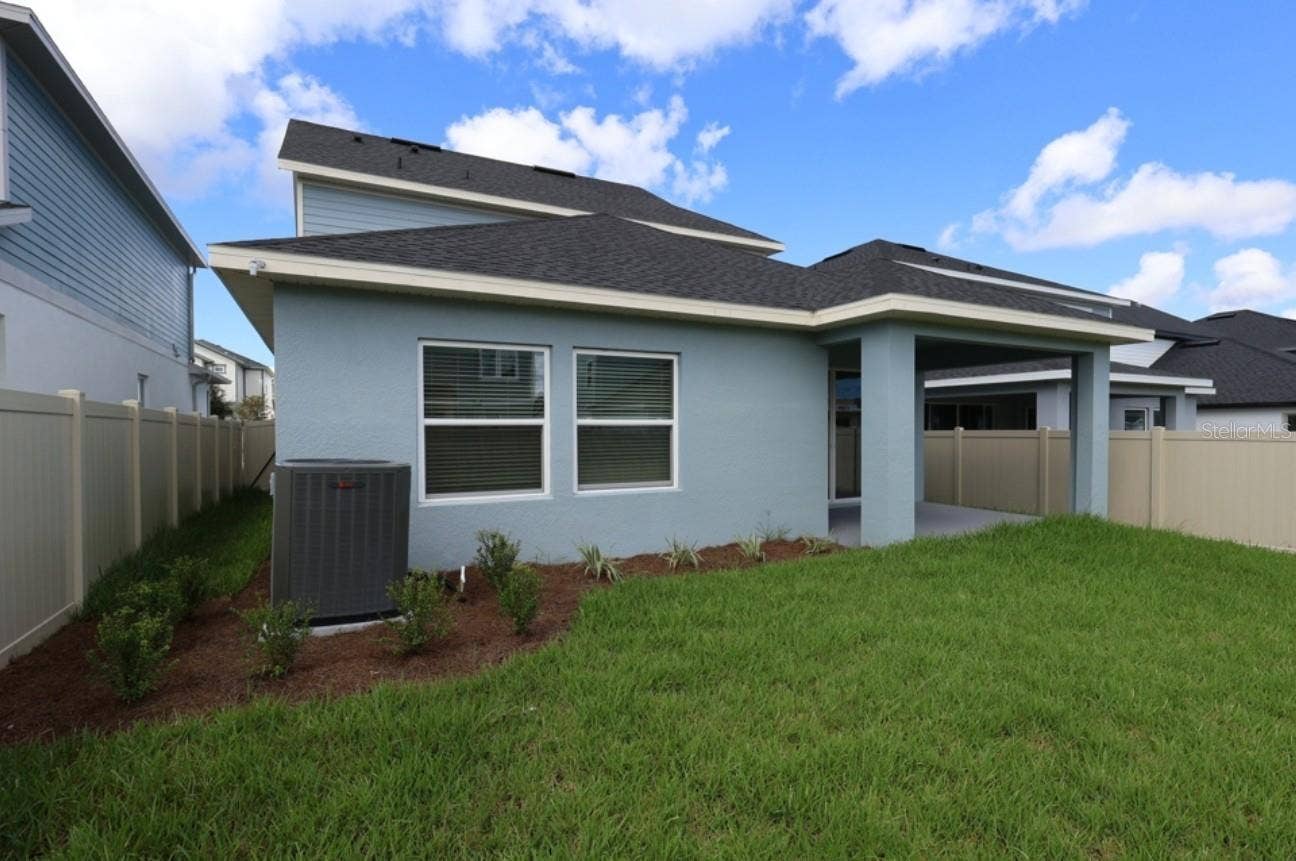 5825 NATIVE OAK STREET, Mount Dora, FL 32757 Rear Exterior **Under Construction
