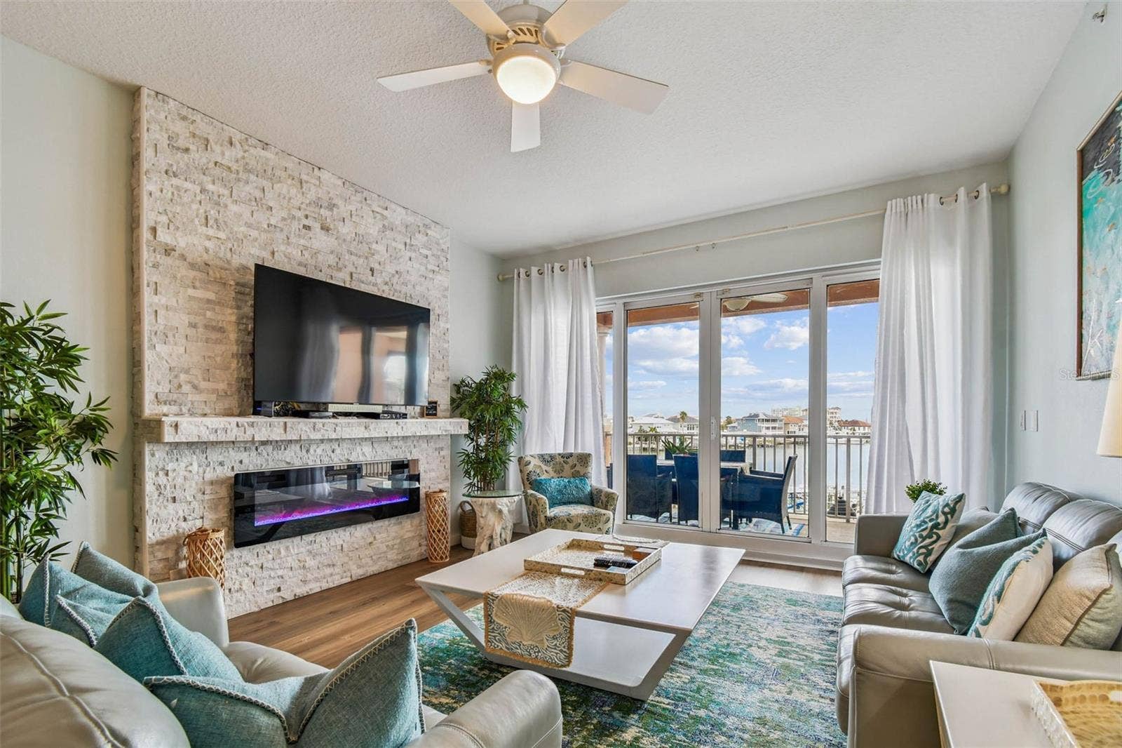 530 S GULFVIEW BOULEVARD, #304, Clearwater Beach, FL 33767 Leather living room furniture with a coastal palette