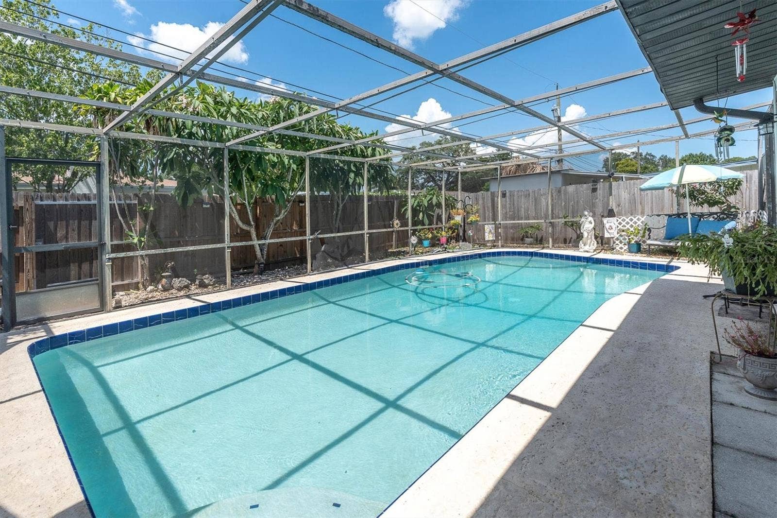 3227 48TH AVENUE N, St Petersburg, FL 33714 Very nice screened in pool