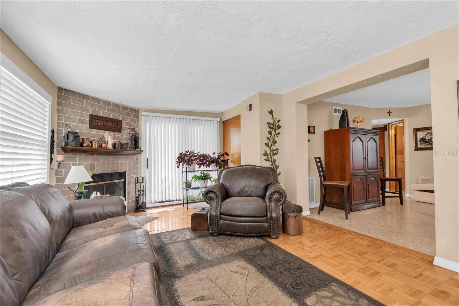 3227 48TH AVENUE N, St Petersburg, FL 33714 Living room with fireplace