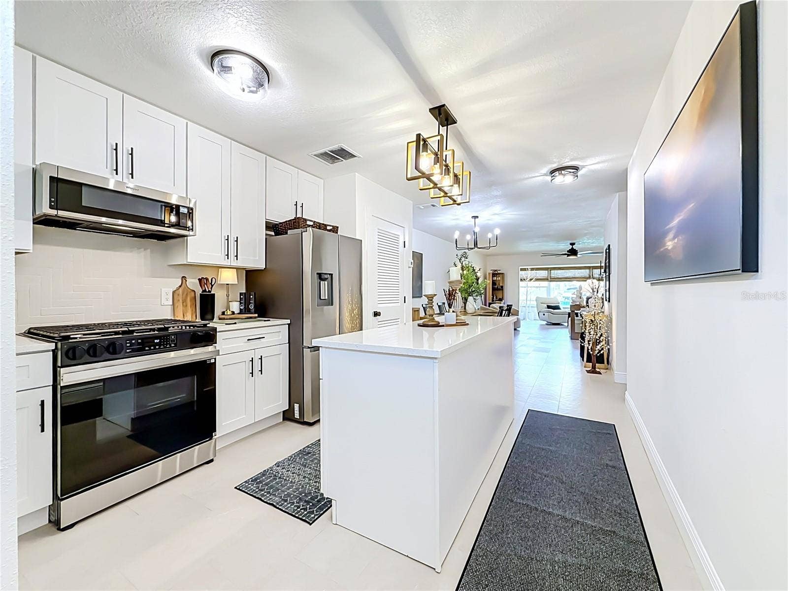 5935 30TH AVENUE S, #104, Gulfport, FL 33707 Updated kitchen with shaker cabinetry