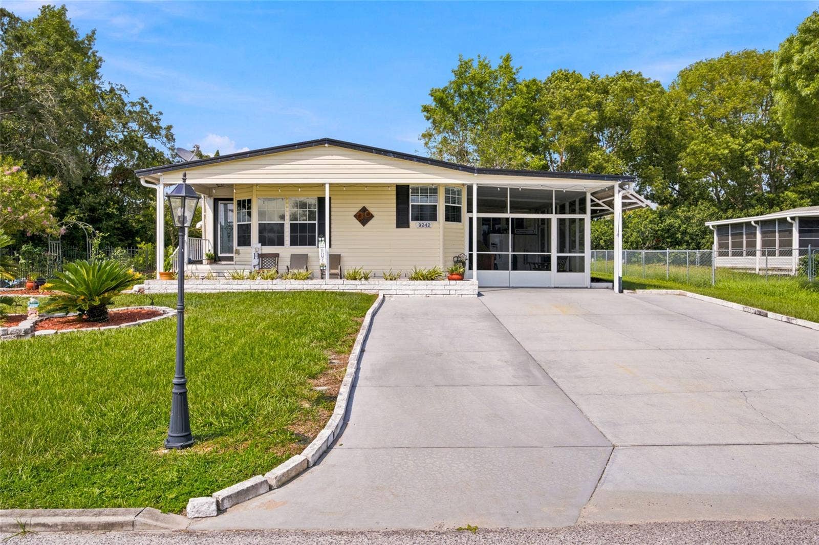 9242 DENMARSH DRIVE, Brooksville, FL 34613 Front - Has a Screened in Lanai with Handicap Ramp