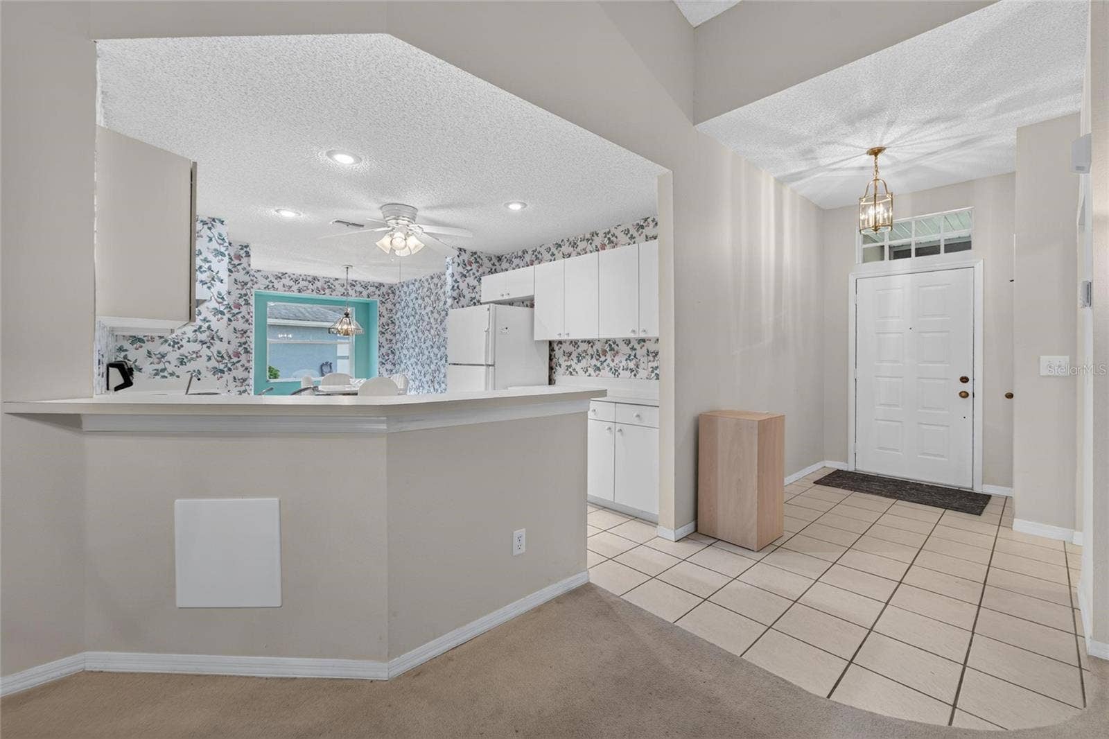 1023 MCDANIEL STREET, #139, Sun City Center, FL 33573 Kitchen and Entryway