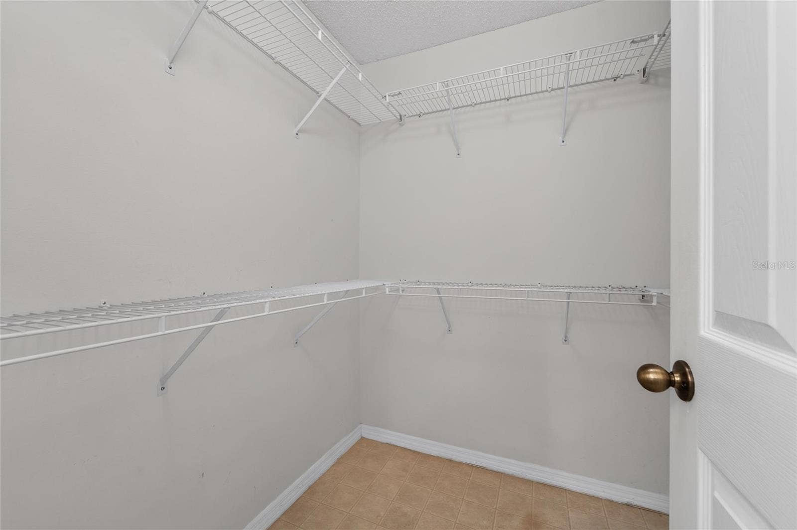 1023 MCDANIEL STREET, #139, Sun City Center, FL 33573 Walk-in Closet in Primary Suite