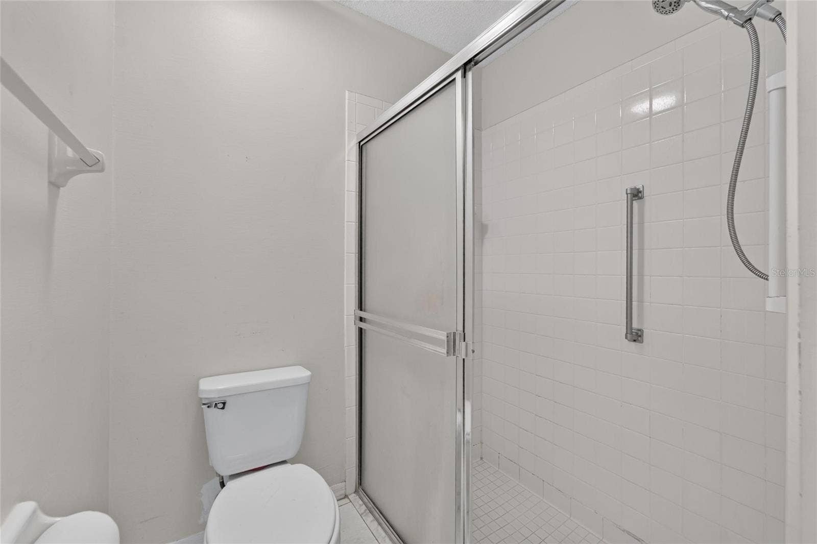 1023 MCDANIEL STREET, #139, Sun City Center, FL 33573 Walk-in Shower in Primary Bath