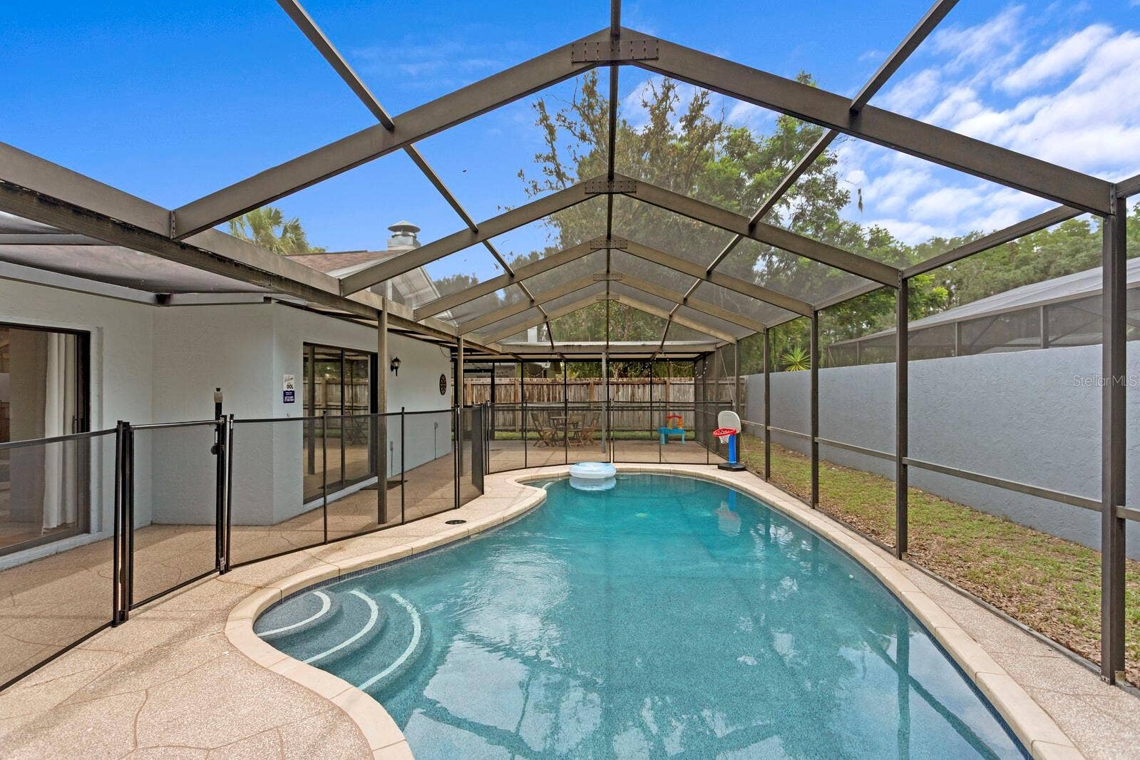 12803 RAIN FOREST STREET, Temple Terrace, FL 33617 Removable Child Safety Fence Included