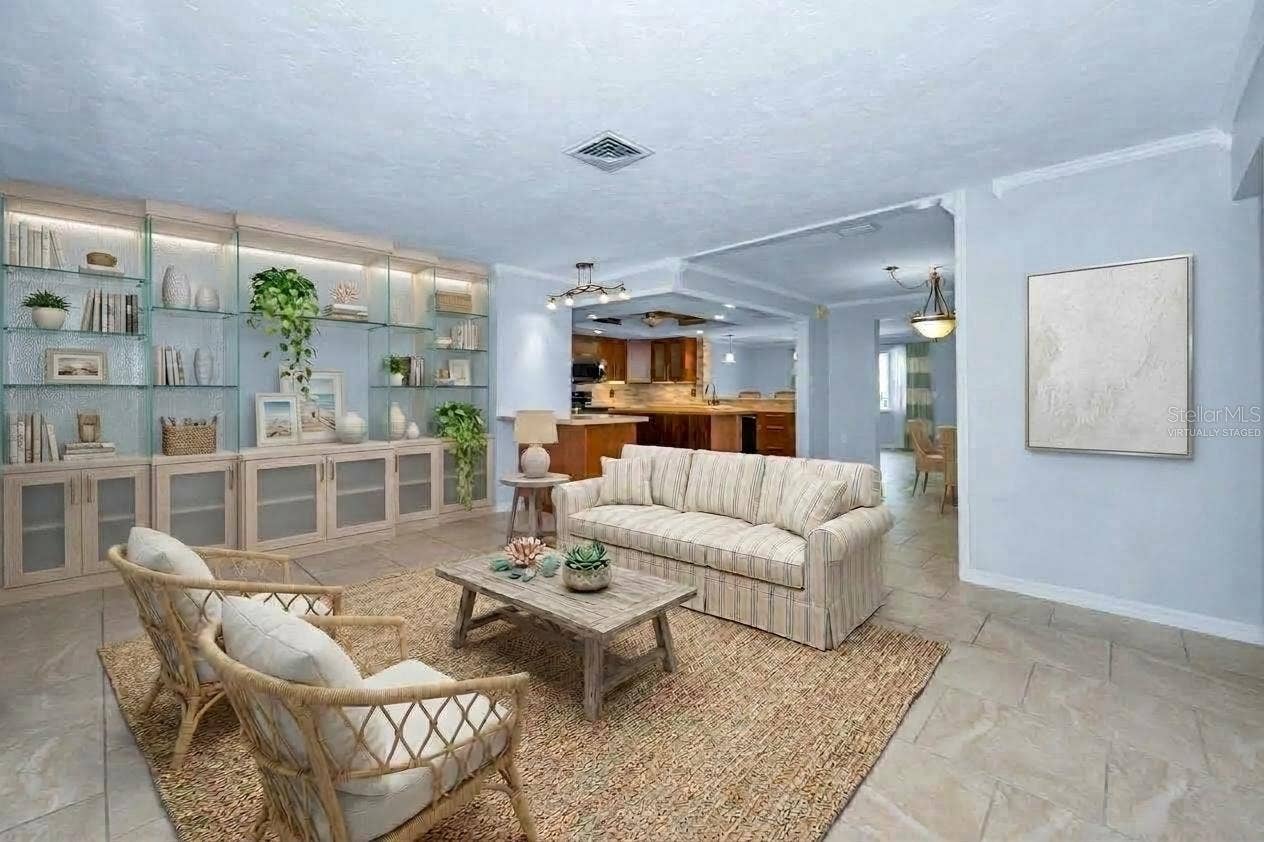 13760 87TH PLACE, Seminole, FL 33776 Virtually Staged Living Room looking into the Kitchen