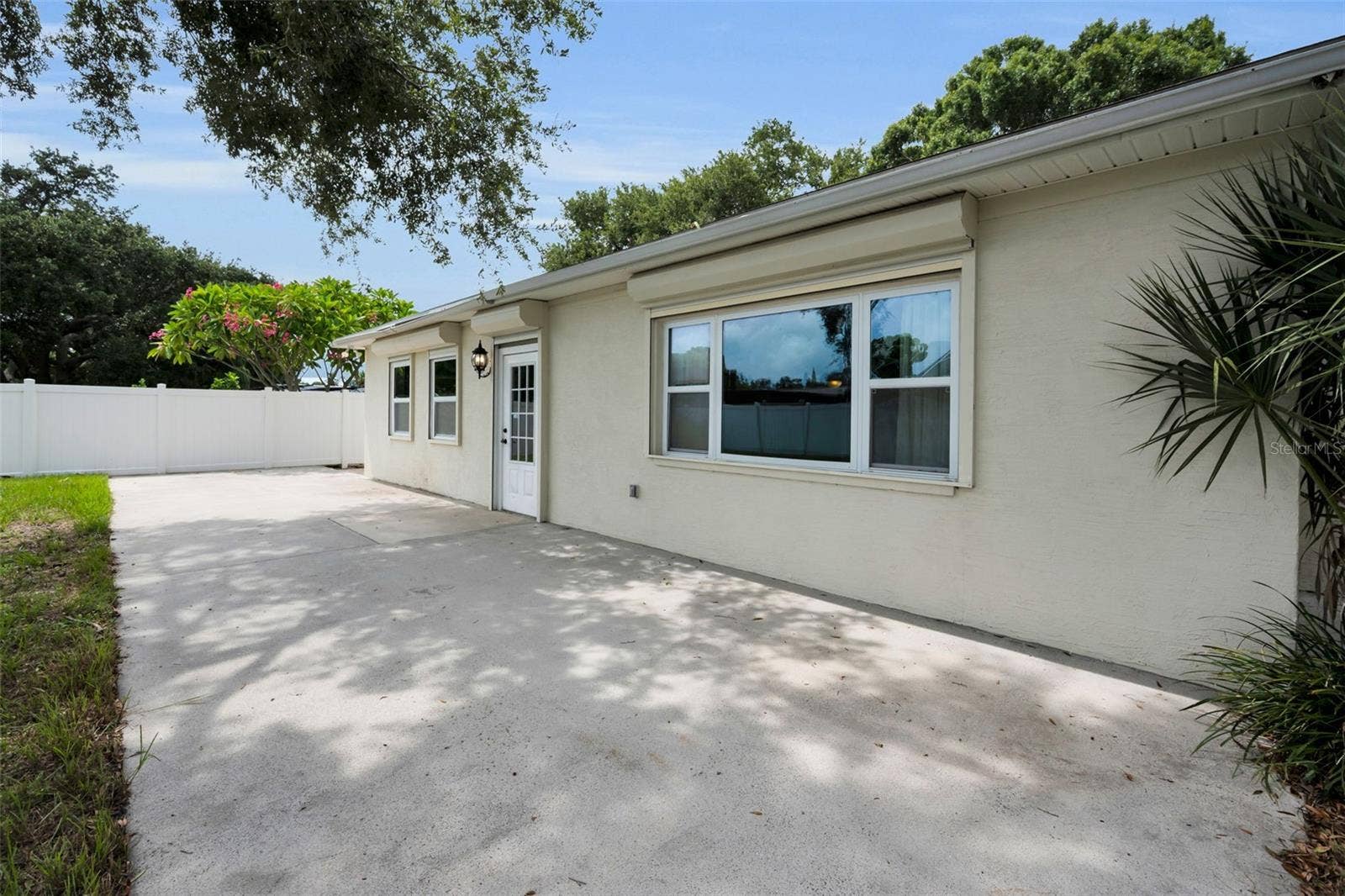 13760 87TH PLACE, Seminole, FL 33776 Huge Patio off the back of the home in the backyard.