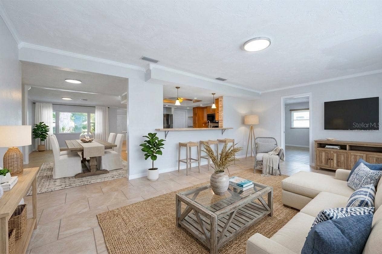 13760 87TH PLACE, Seminole, FL 33776 Virtually Staged Family Room looking into the Kitchen