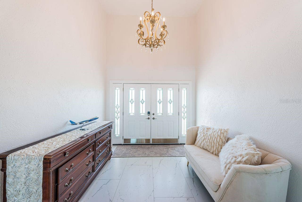 4280 13TH LANE NE, St Petersburg, FL 33703 Foyer entry with vaulted ceiling