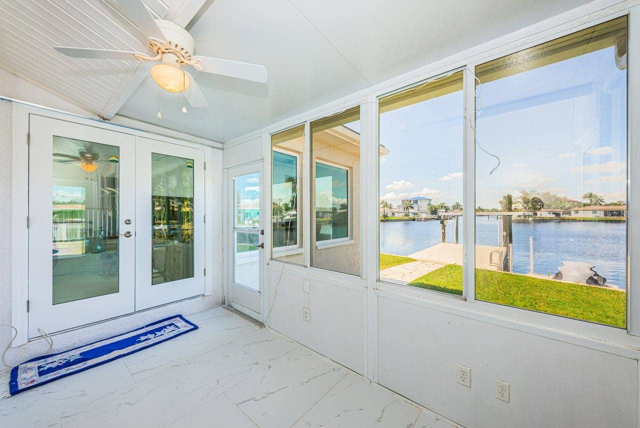 4280 13TH LANE NE, St Petersburg, FL 33703 Enclosed back porch
