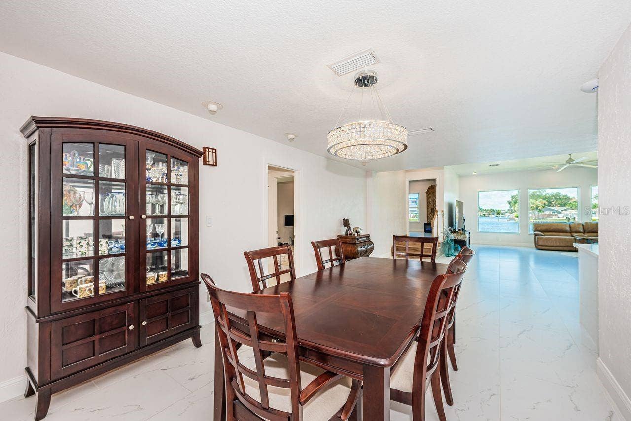 4280 13TH LANE NE, St Petersburg, FL 33703 Dining opens up to expansive living space