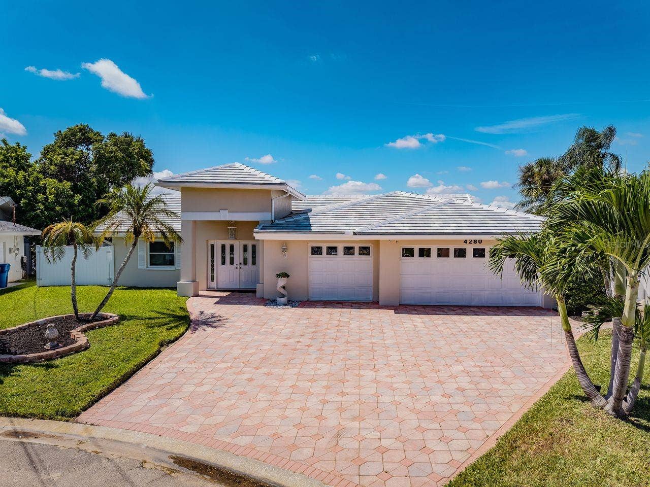 4280 13TH LANE NE, St Petersburg, FL 33703 Pretty paver drive highlights this beautiful home