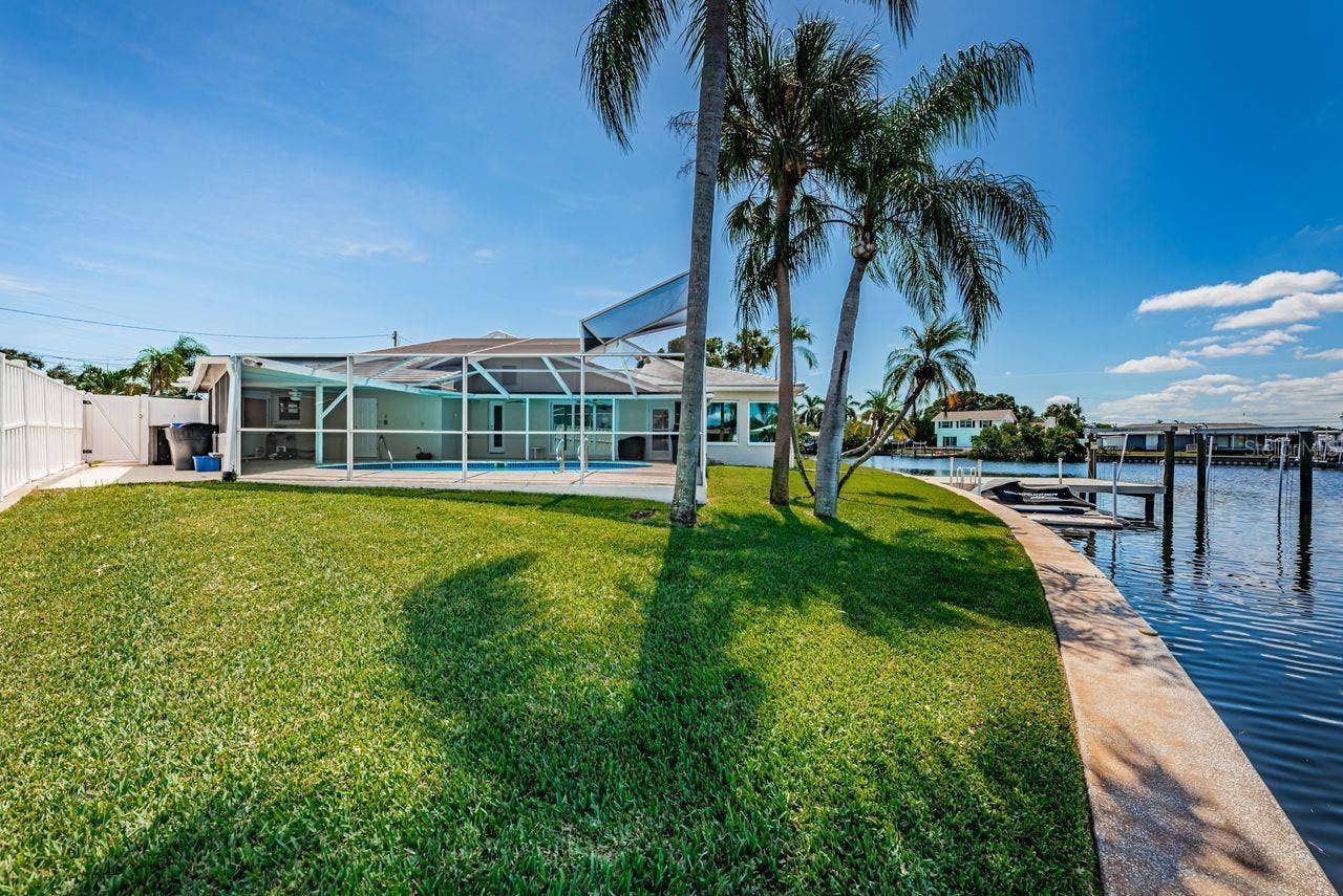 4280 13TH LANE NE, St Petersburg, FL 33703 New seawall with a cap that won't blacken with age