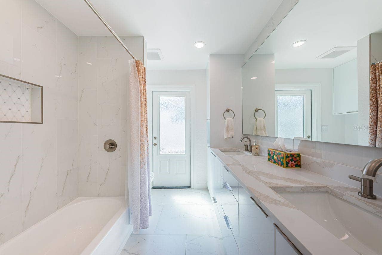 4280 13TH LANE NE, St Petersburg, FL 33703 Bathroom 2 situated between 2 bedrooms