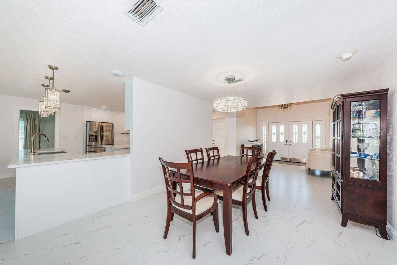 4280 13TH LANE NE, St Petersburg, FL 33703 Foyer into the dining room