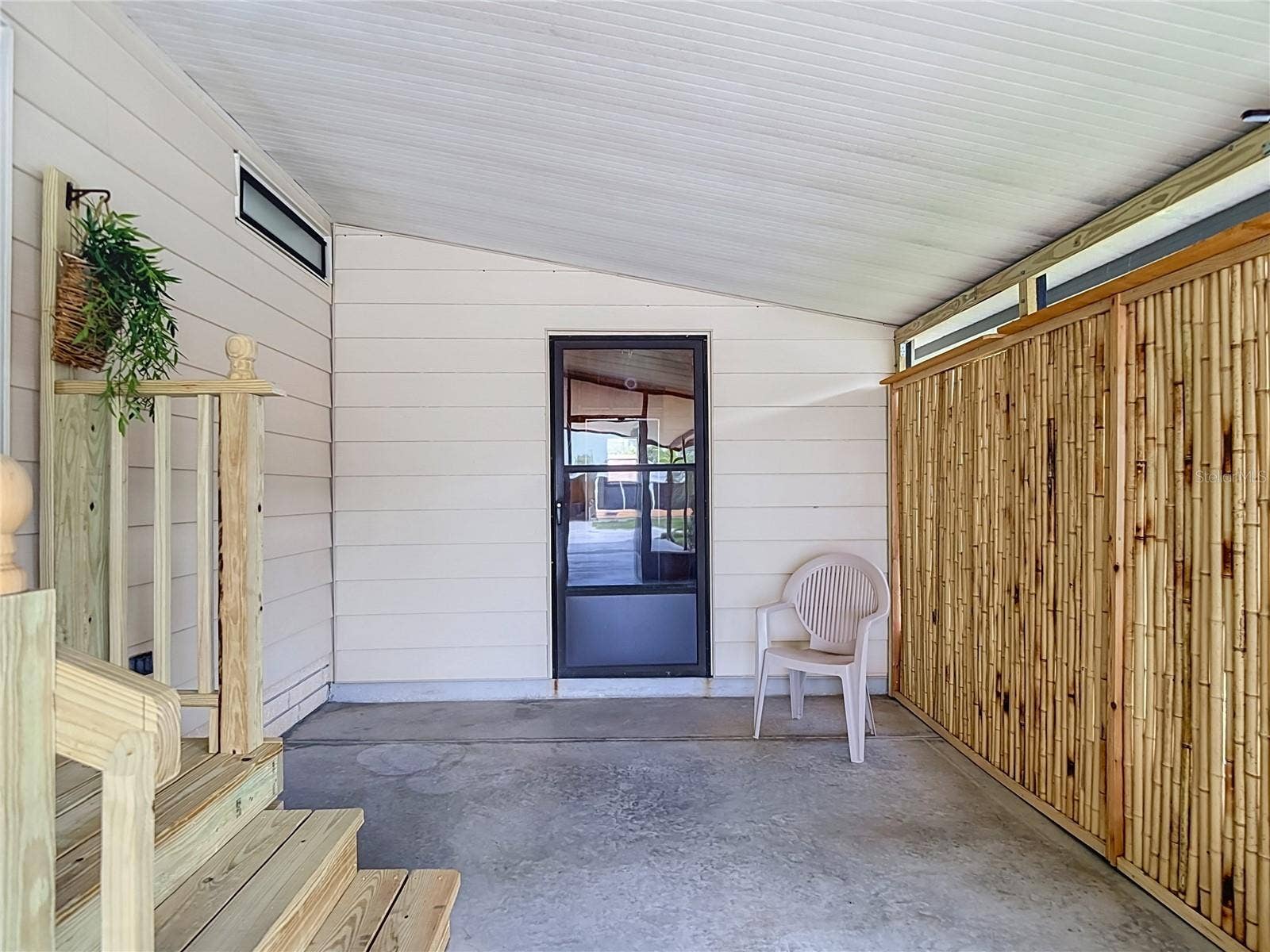 4919 BLANCO DRIVE, Zephyrhills, FL 33541 Side Screened Porch