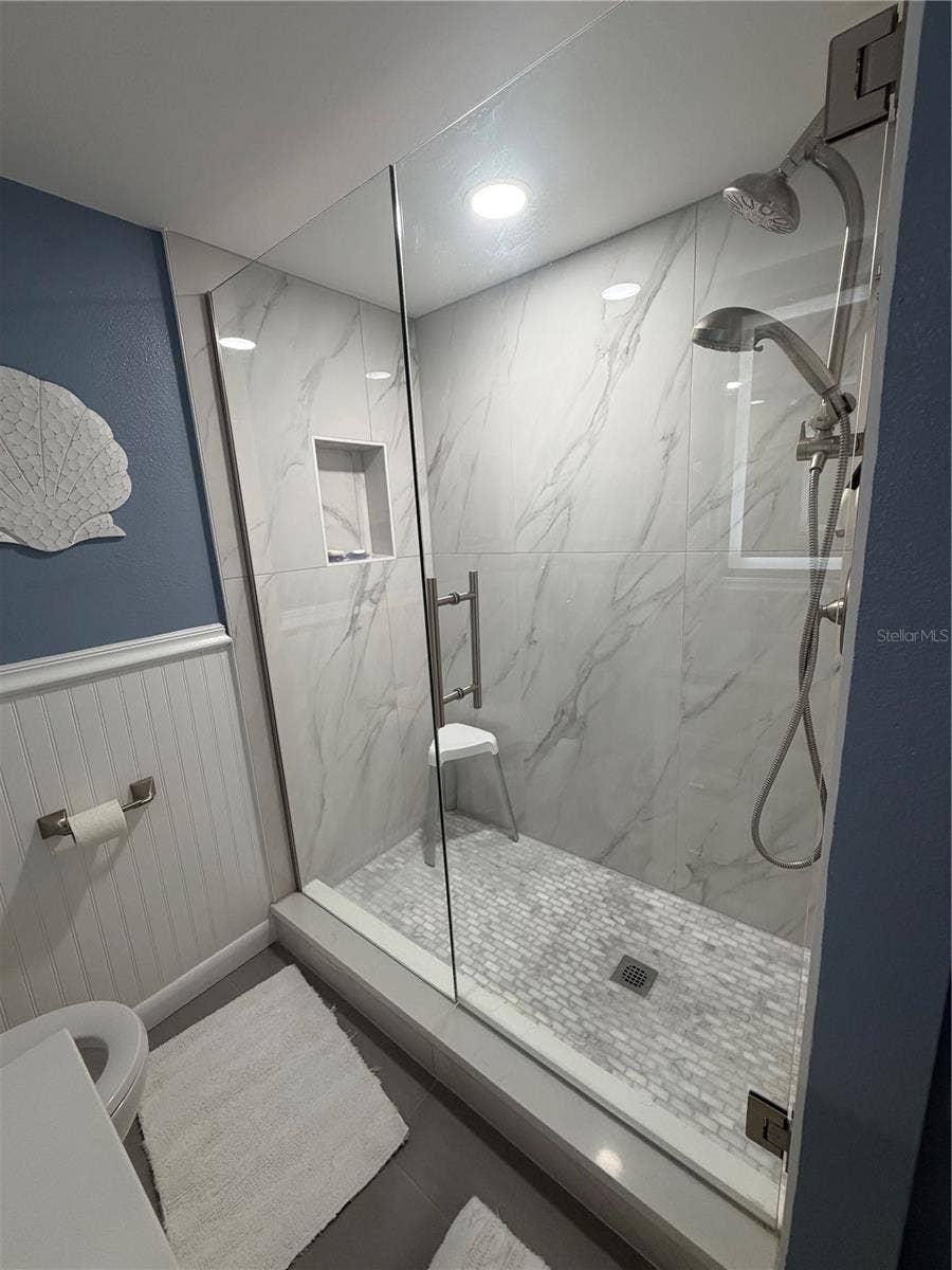 1270 GULF BOULEVARD, #707, Clearwater Beach, FL 33767 Renovated Primary bath shower.