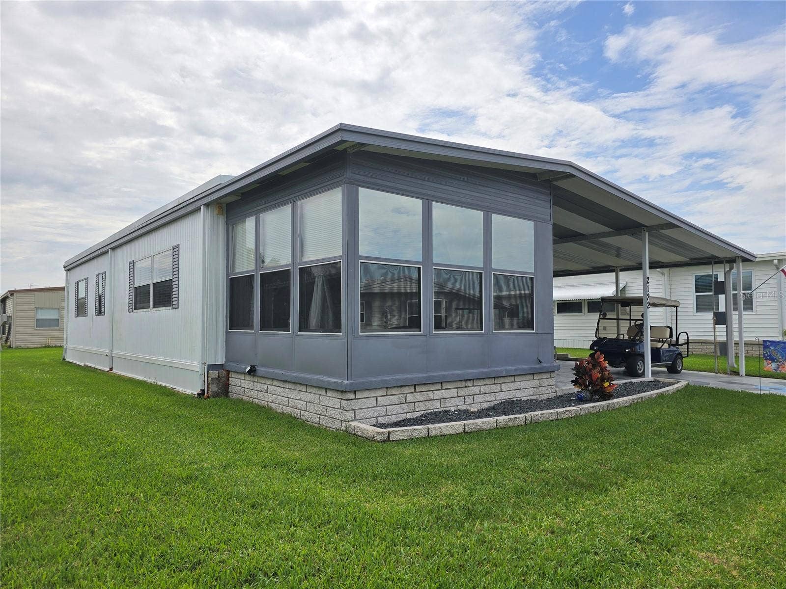 2122 WATERVIEW DRIVE, Holiday, FL 34691 Front enclosed porch