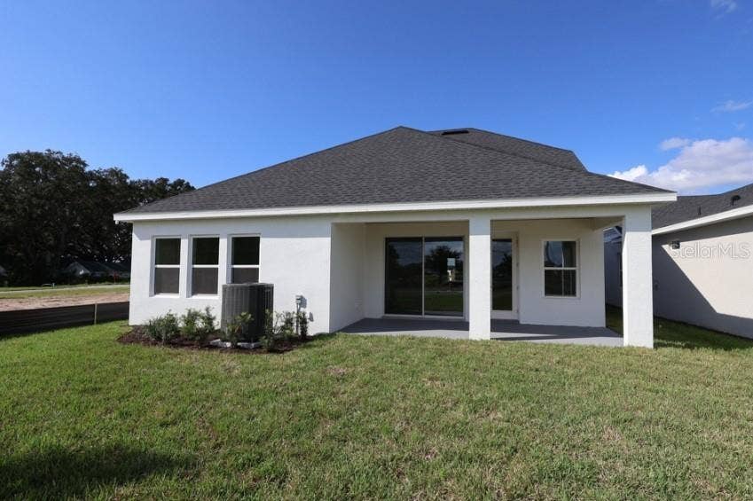 5111 CHATTAHOOCHEE BEND, St Cloud, FL 34771 Rear Exterior **Under Construction