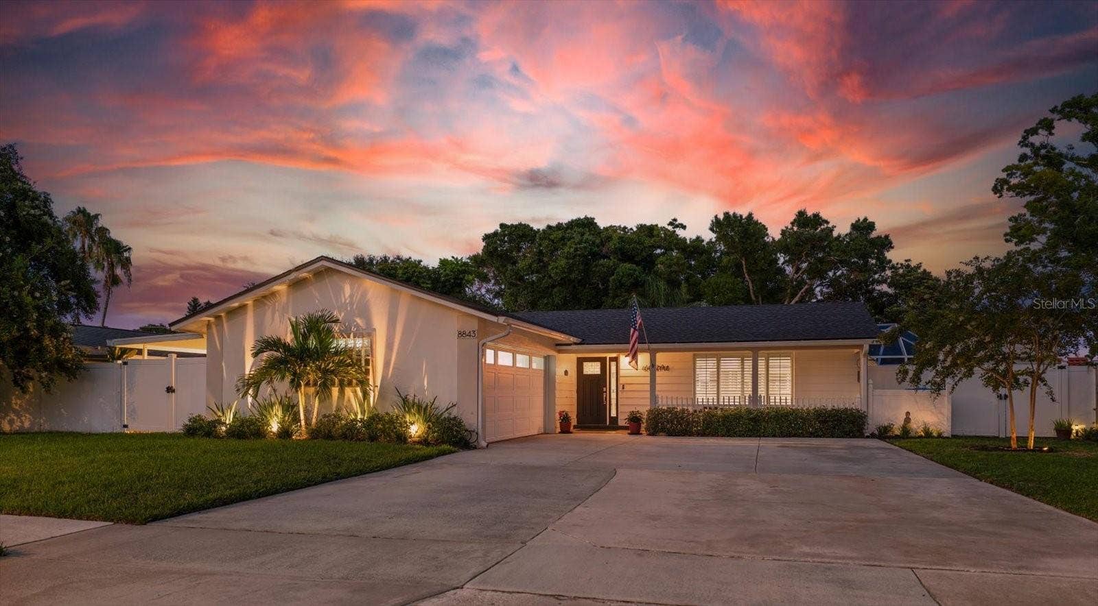 8843 117TH STREET, Seminole, FL 33772 Front of home at twilight