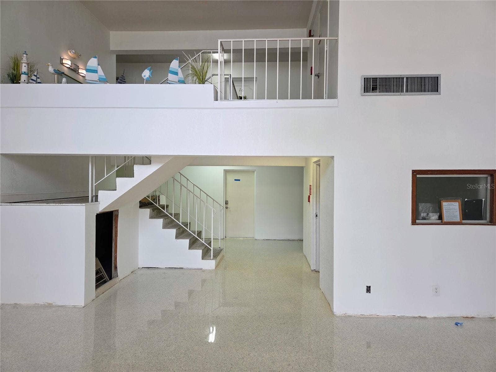 10365 PARADISE BOULEVARD, #13, Treasure Island, FL 33706 Entry Foyer Undergoing Renovations