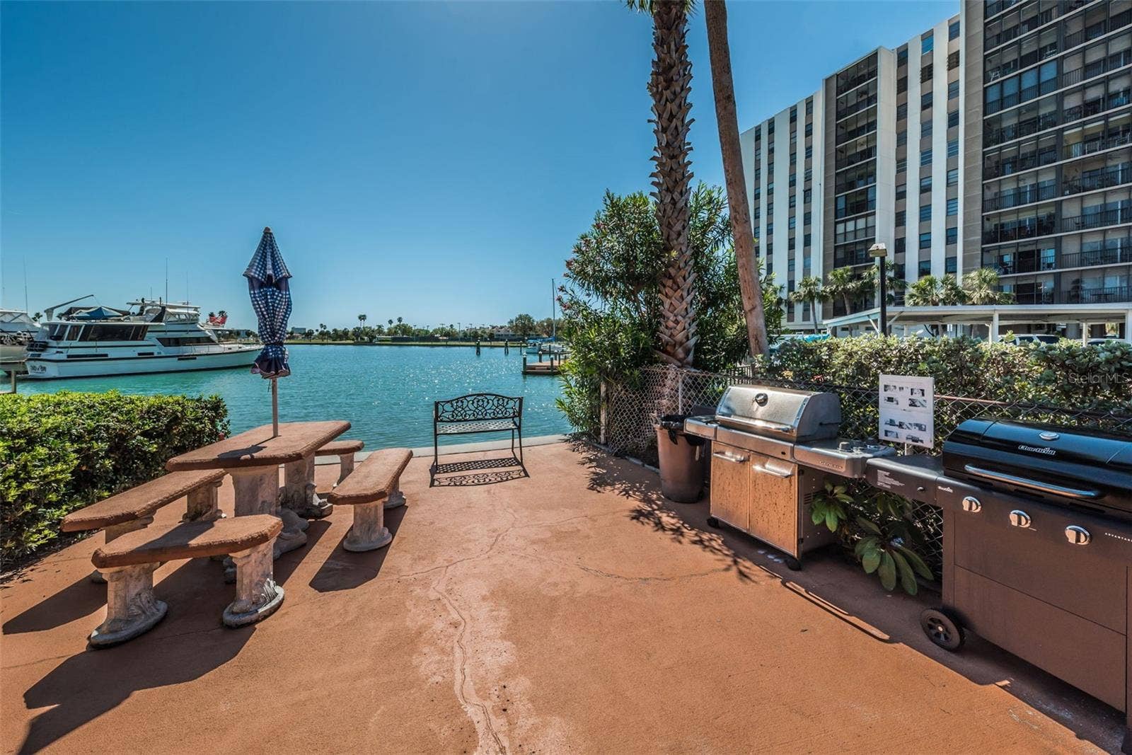 10365 PARADISE BOULEVARD, #13, Treasure Island, FL 33706 Waterfront Grilling and Deck Area