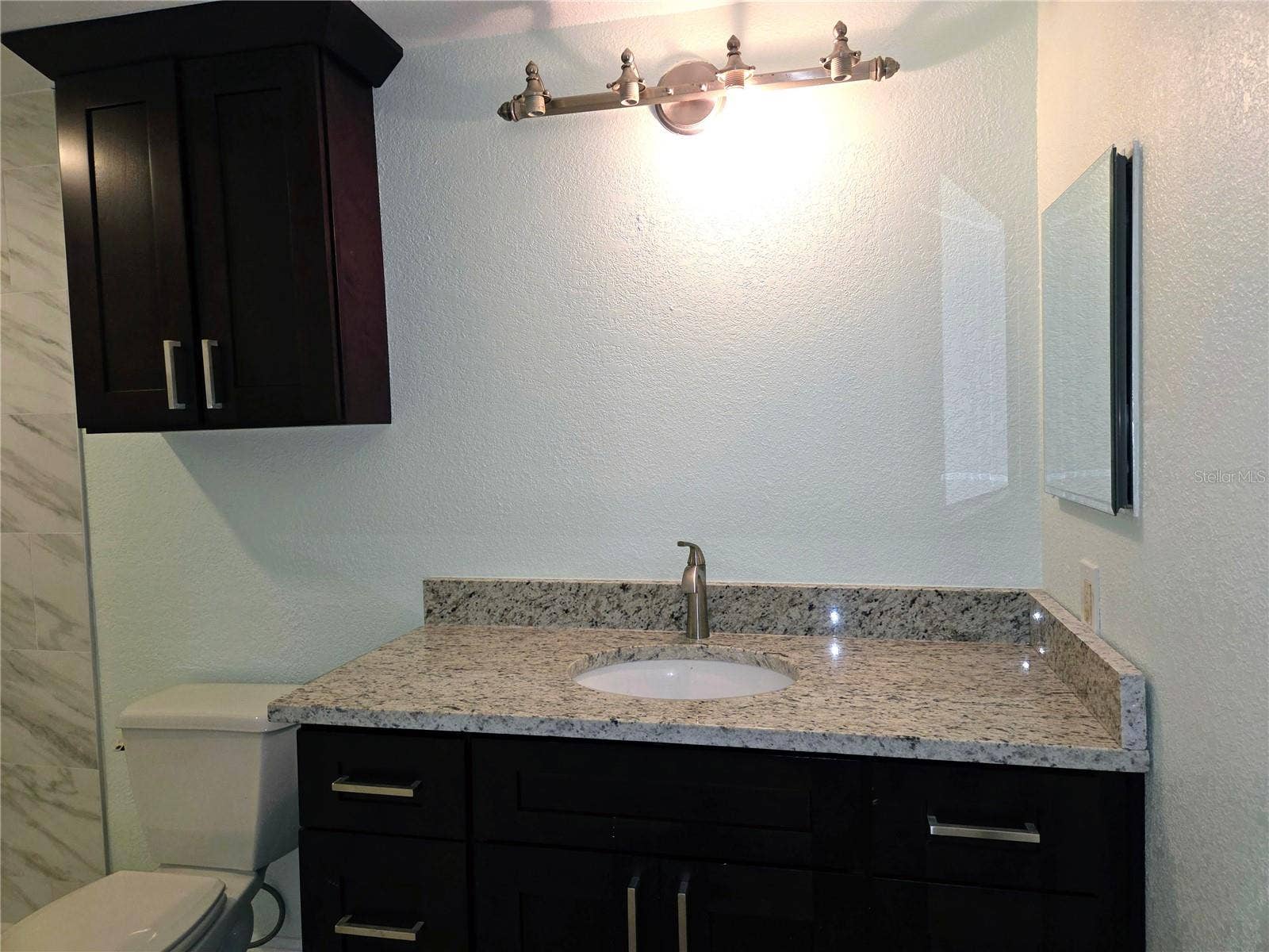 10365 PARADISE BOULEVARD, #13, Treasure Island, FL 33706 New Bathroom with Vanity, Stone Countertop