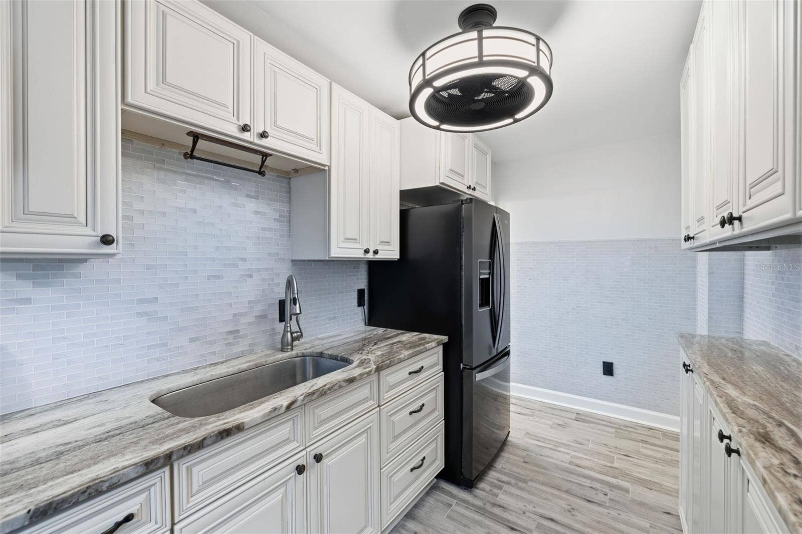 841 4TH AVENUE N, #27, St Petersburg, FL 33701 Updated kitchen with a bright, neutral palette that flows seamlessly with the rest of the home.