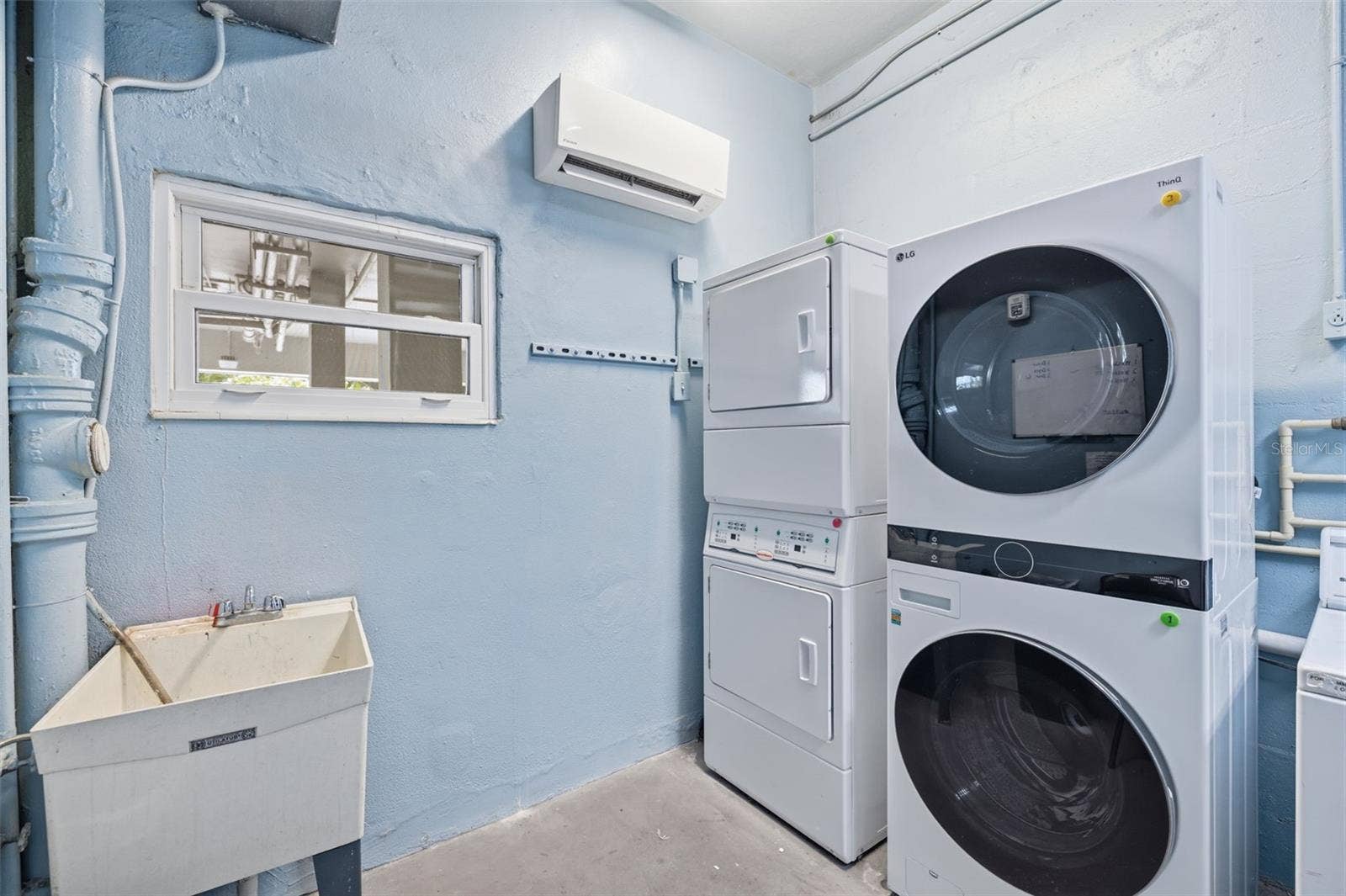 841 4TH AVENUE N, #27, St Petersburg, FL 33701 Updated community laundry facilities feature newer equipment for residents convenience.