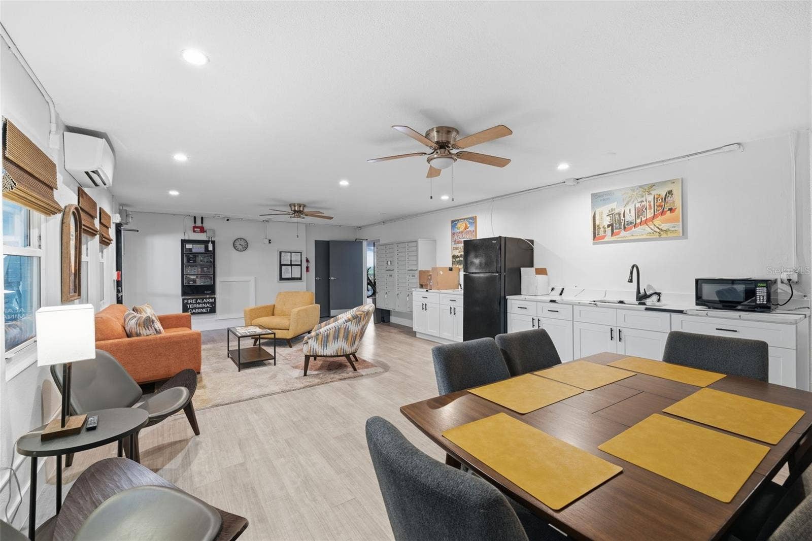 841 4TH AVENUE N, #27, St Petersburg, FL 33701 Spacious community gathering area offers residents a comfortable place to socialize, relax, or enjoy activities.