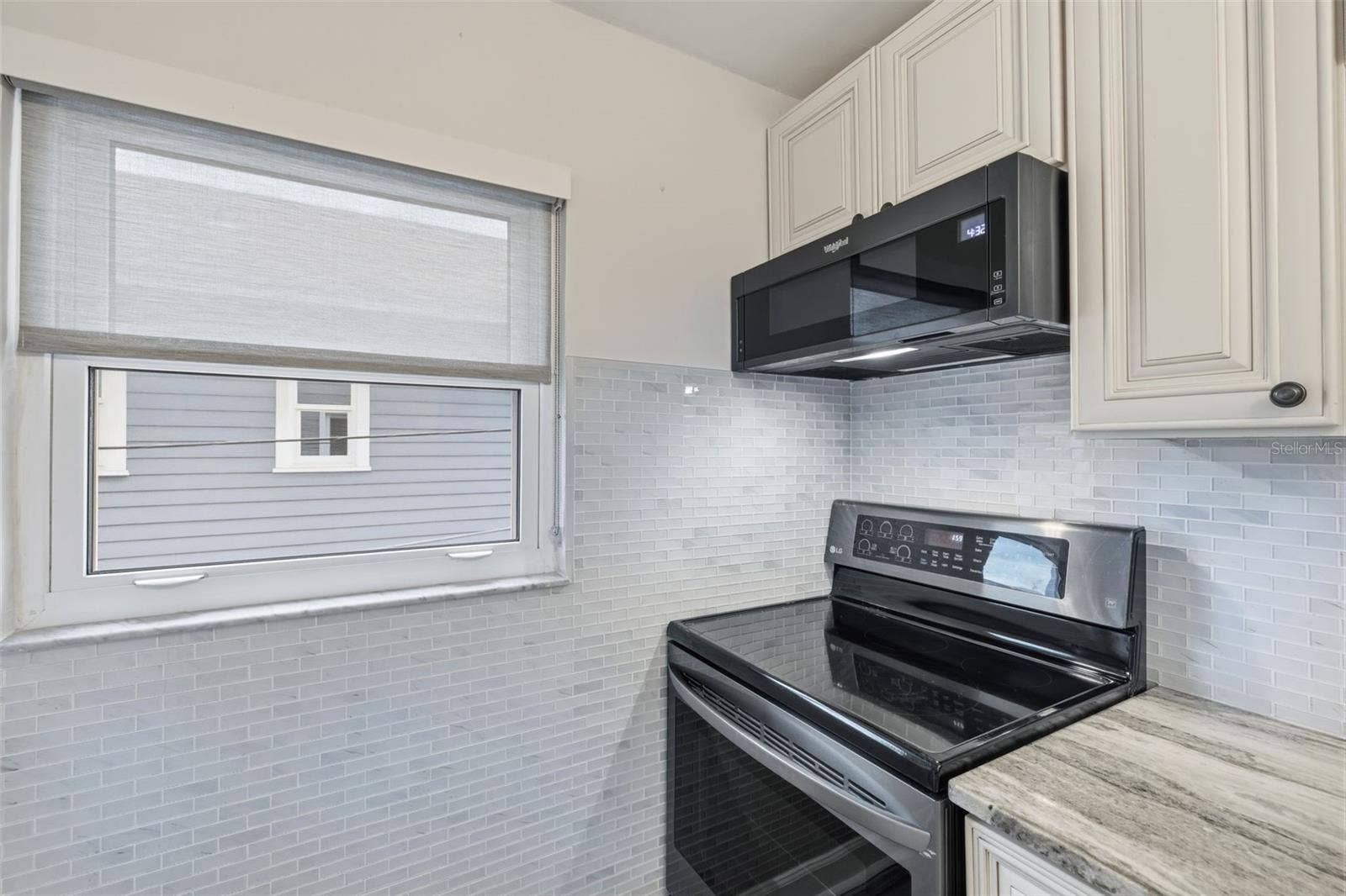 841 4TH AVENUE N, #27, St Petersburg, FL 33701 A functional kitchen layout offers generous cabinetry, counter space, and newer finishes.