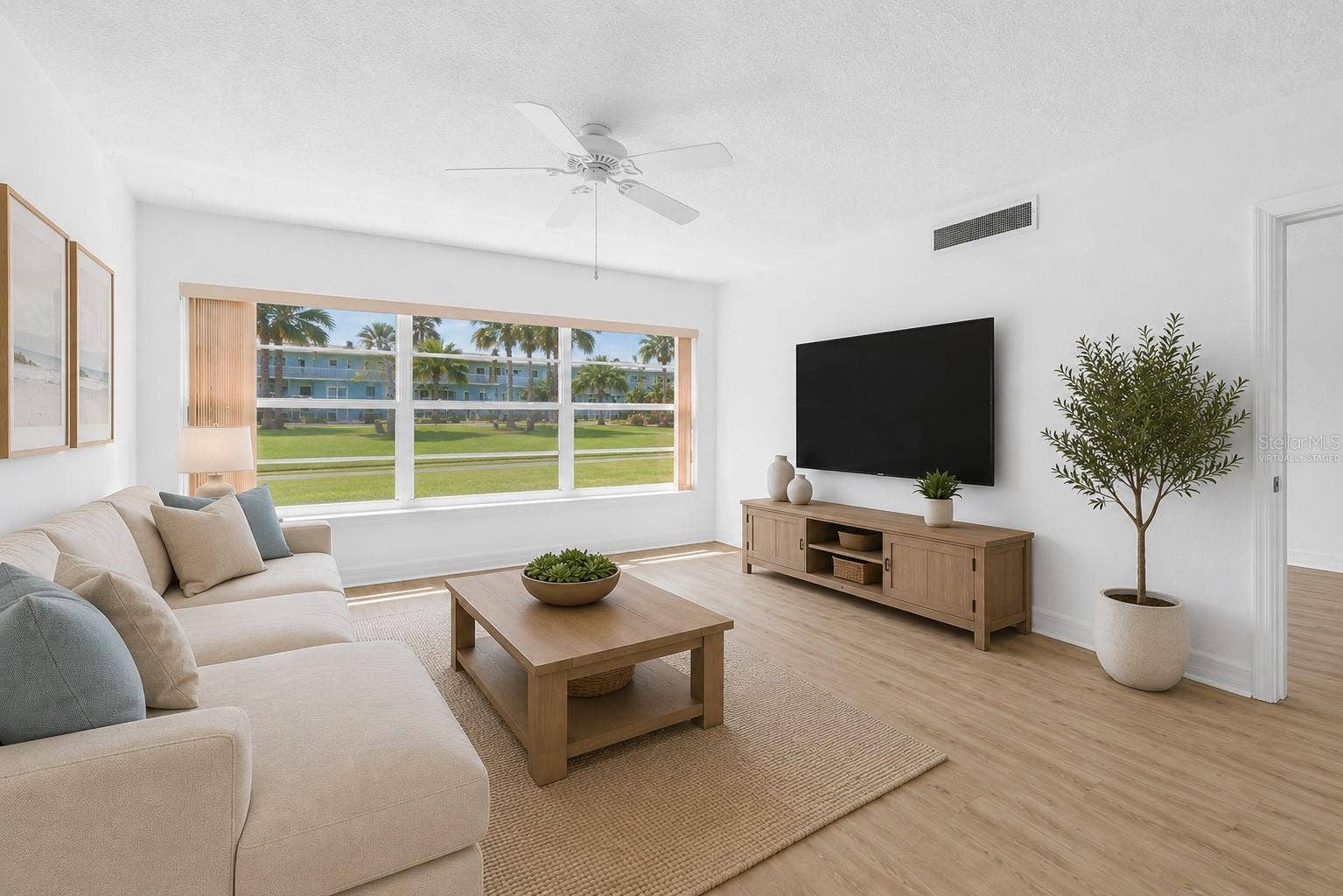 300 64TH AVENUE, #117, St Pete Beach, FL 33706 Living Room Virtually Staged