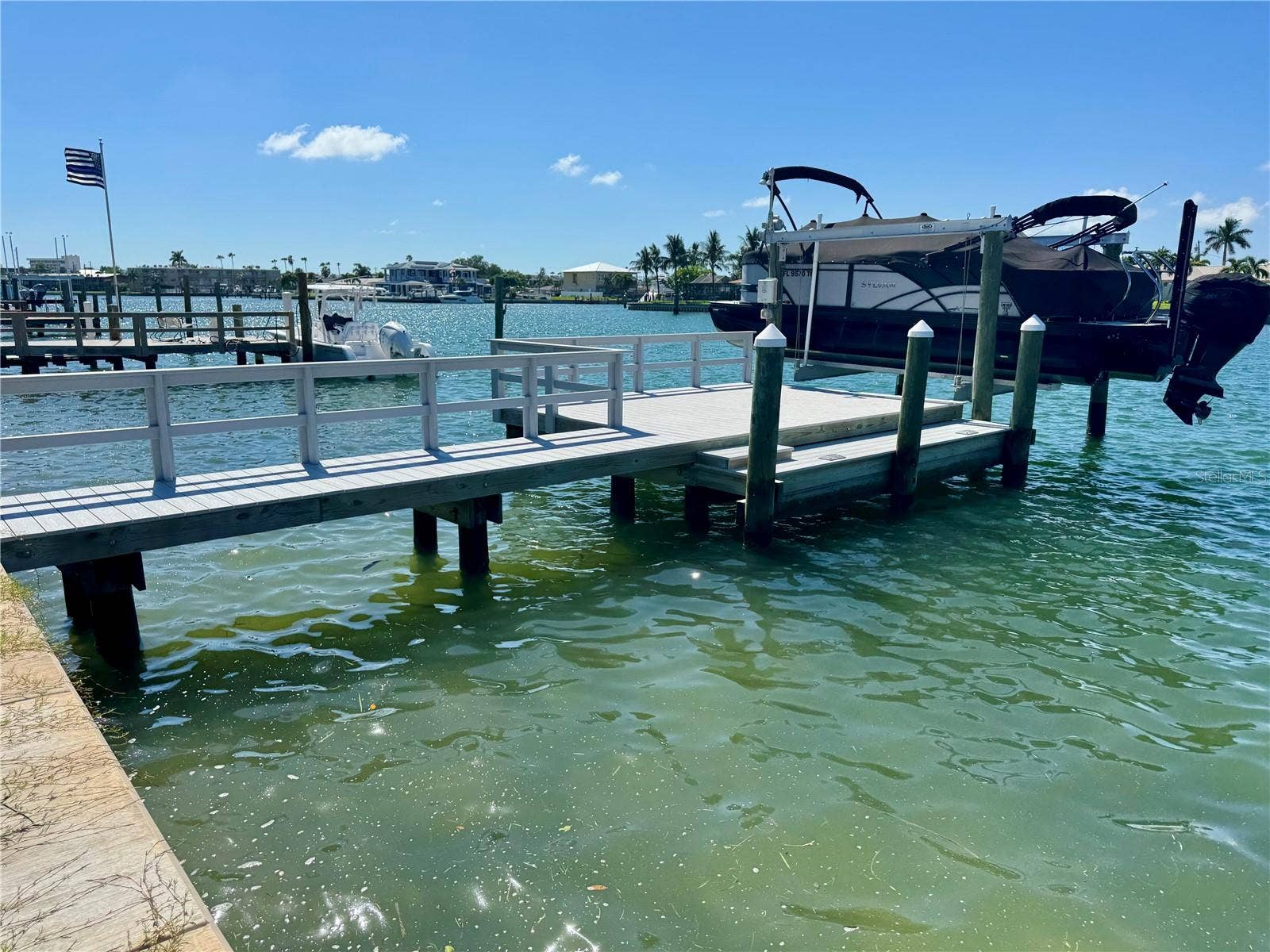 Composite dock with 10,000 lb boat lift.